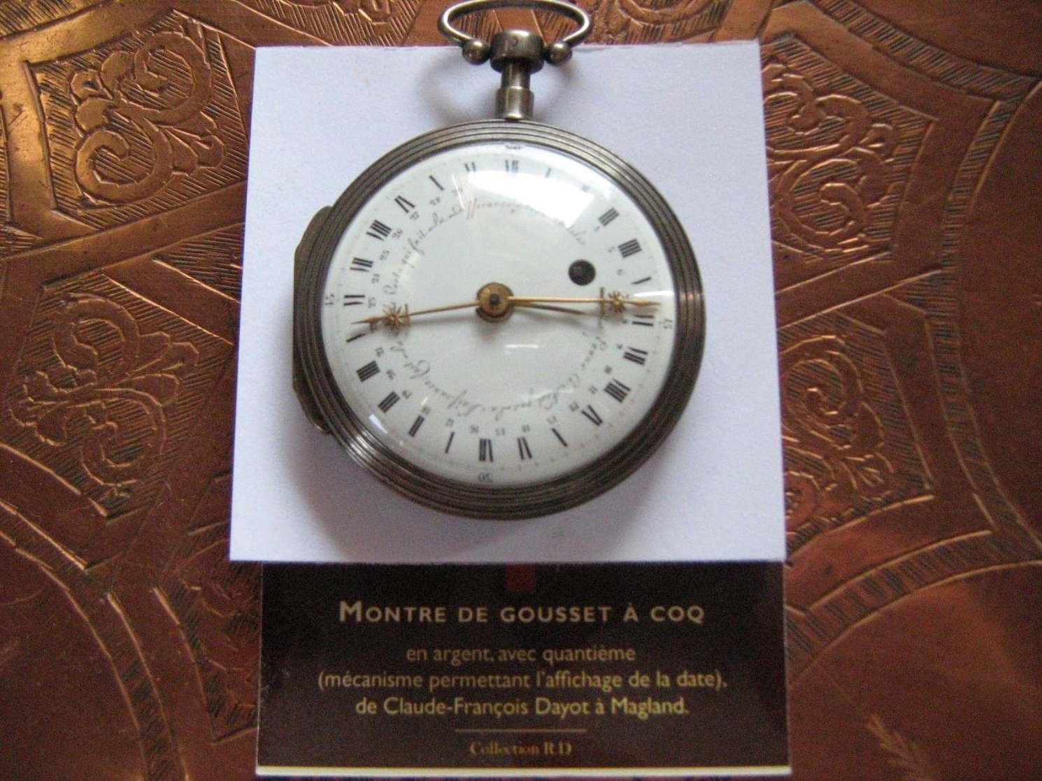 Montre a gousset a coq,donne les quantièmes du mois sur 31 jours, tour de cadran en 24 heures,boitier en argent, fabrication période Napoléon 1°
